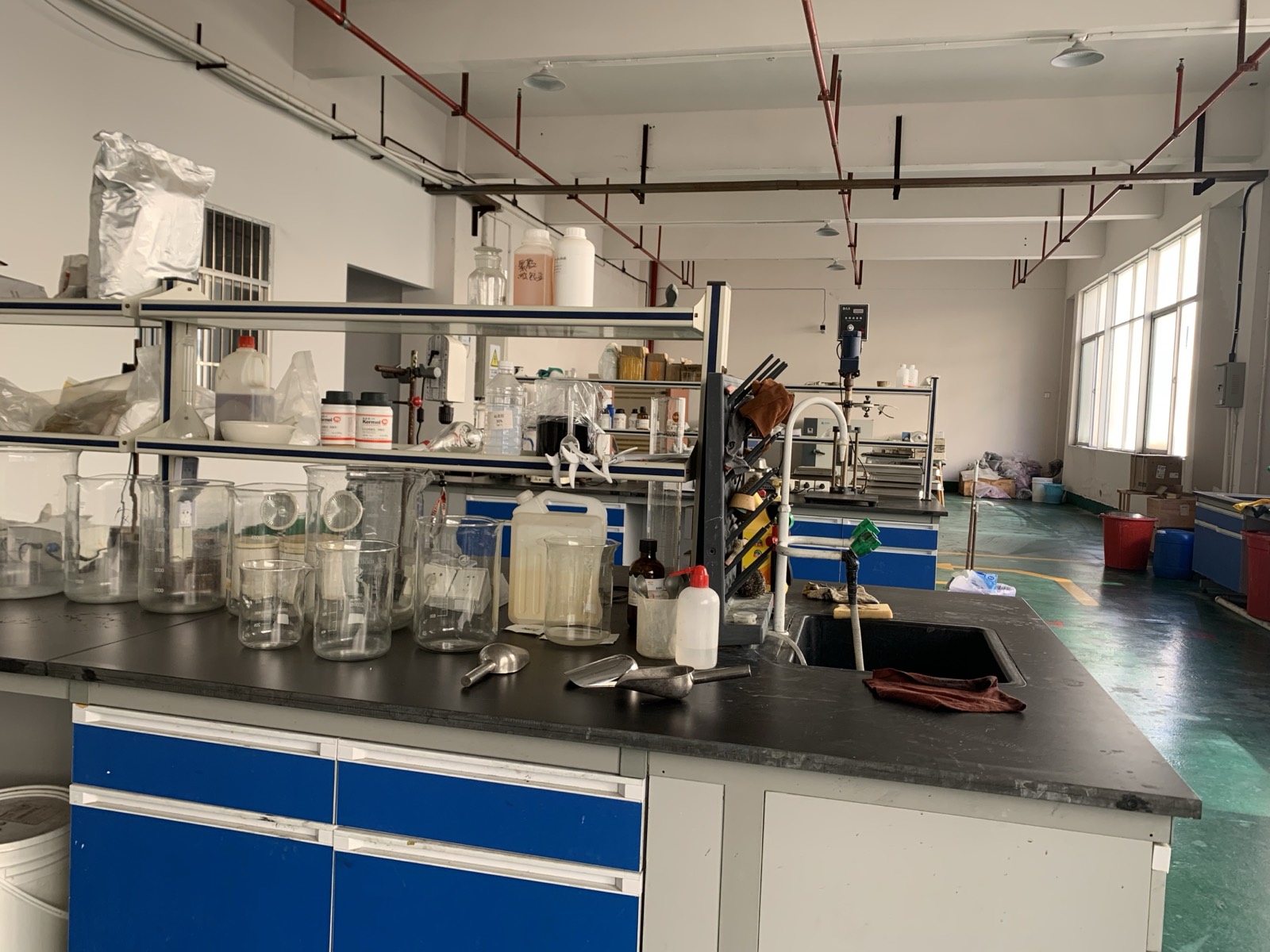 Glass reactor and processing equipment used for lab formulation and scale-up trials.