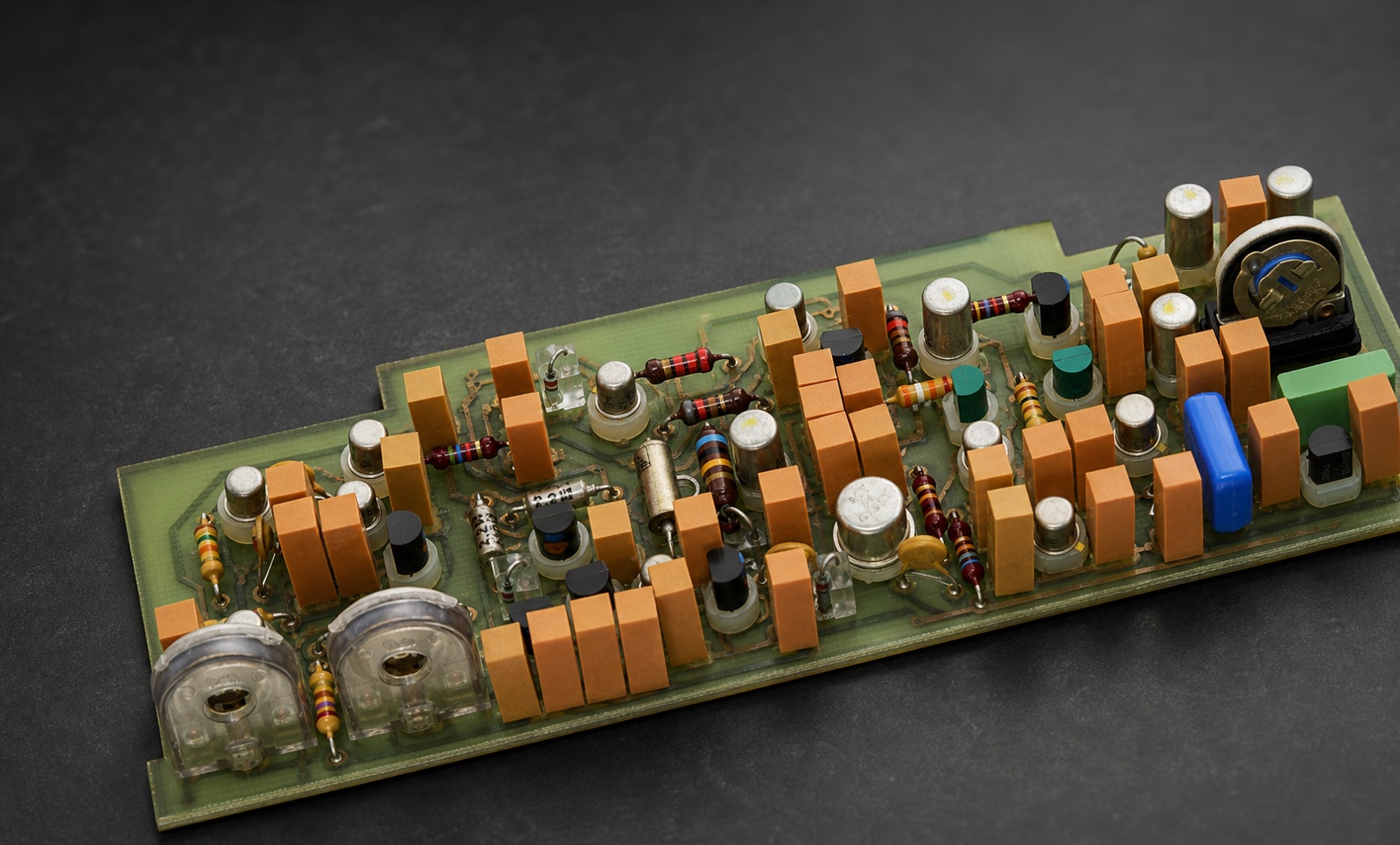 Photorealistic engineering image of a populated circuit board for electronic packaging and interconnect application context.